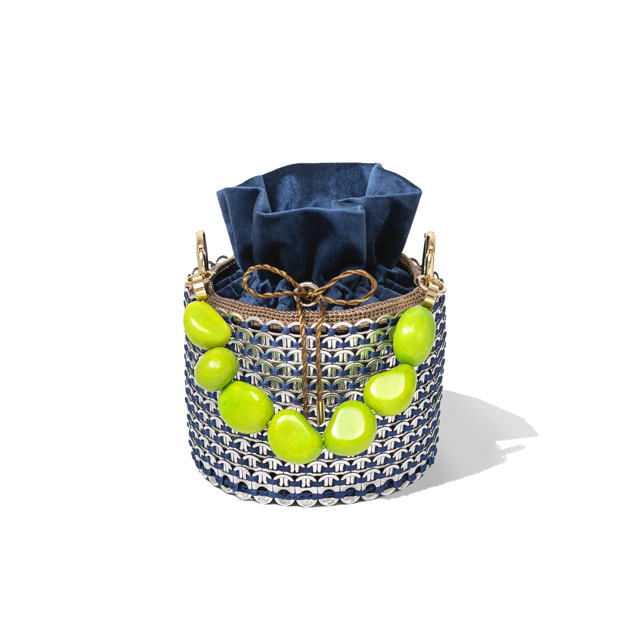 Top view of the Leonard Bucket Bag showcasing the contrast between the deep navy pouch and the vivid green crystal detailing around the rim.